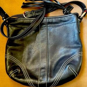 Coach  Mini Hobo black classic leather bag w/ white stitching.